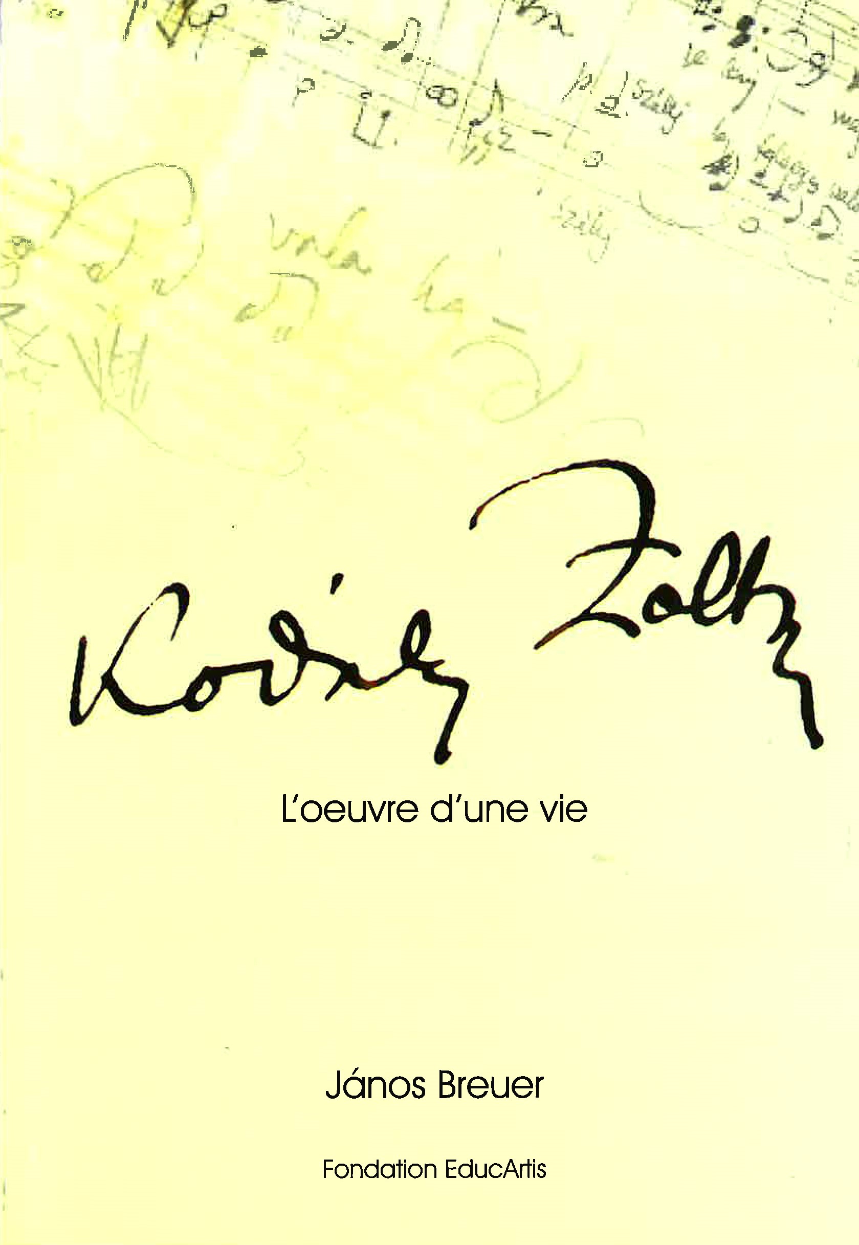 man playing the piano in front of open music book