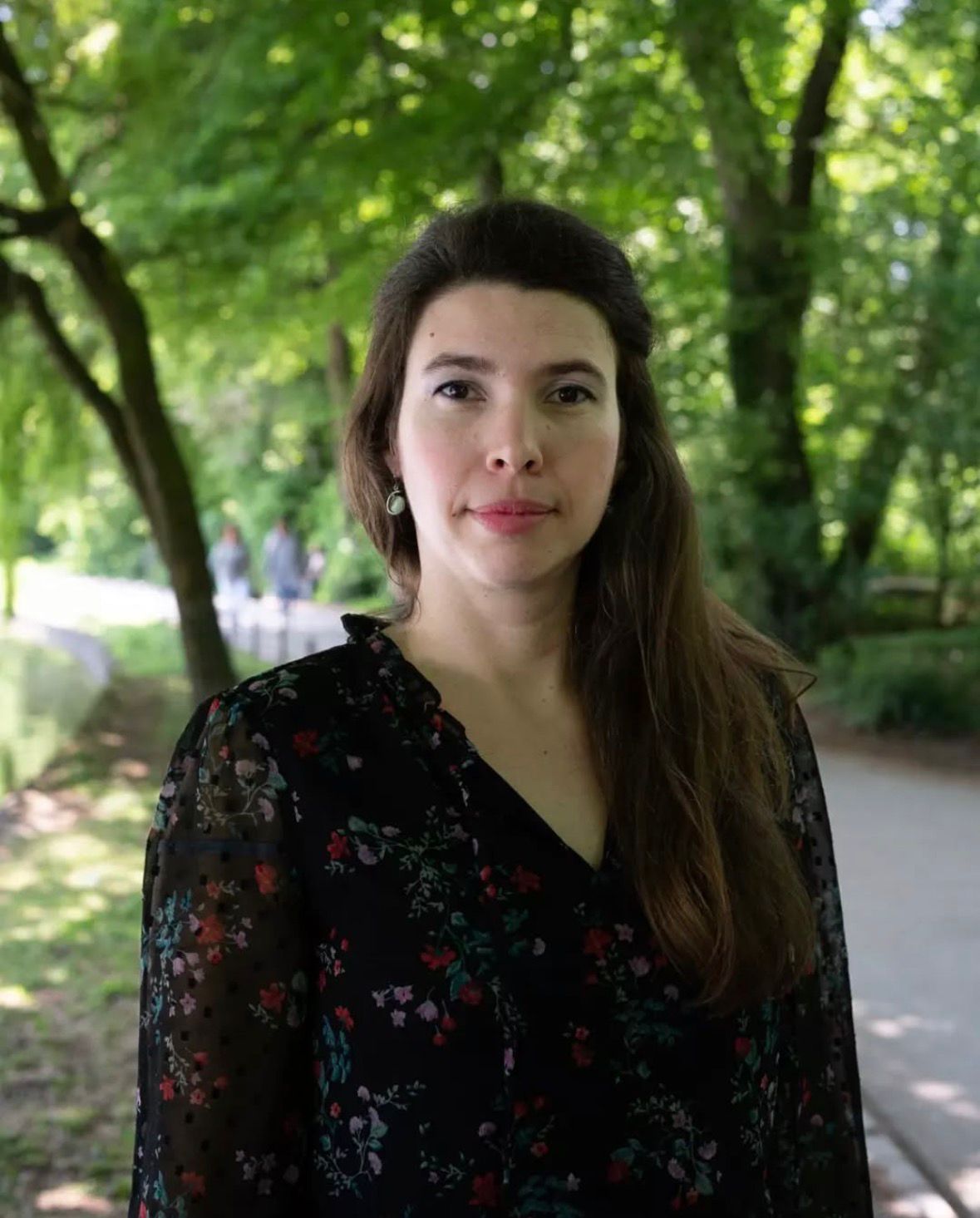 man playing the piano in front of open music book